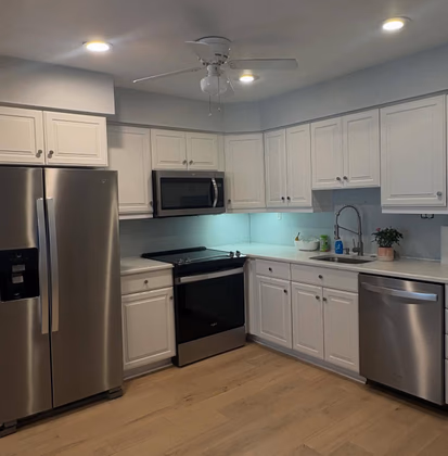 Home cleaning service in a kitchen